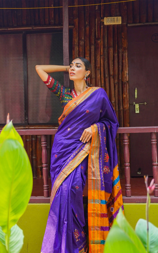 violet saree golden orange border